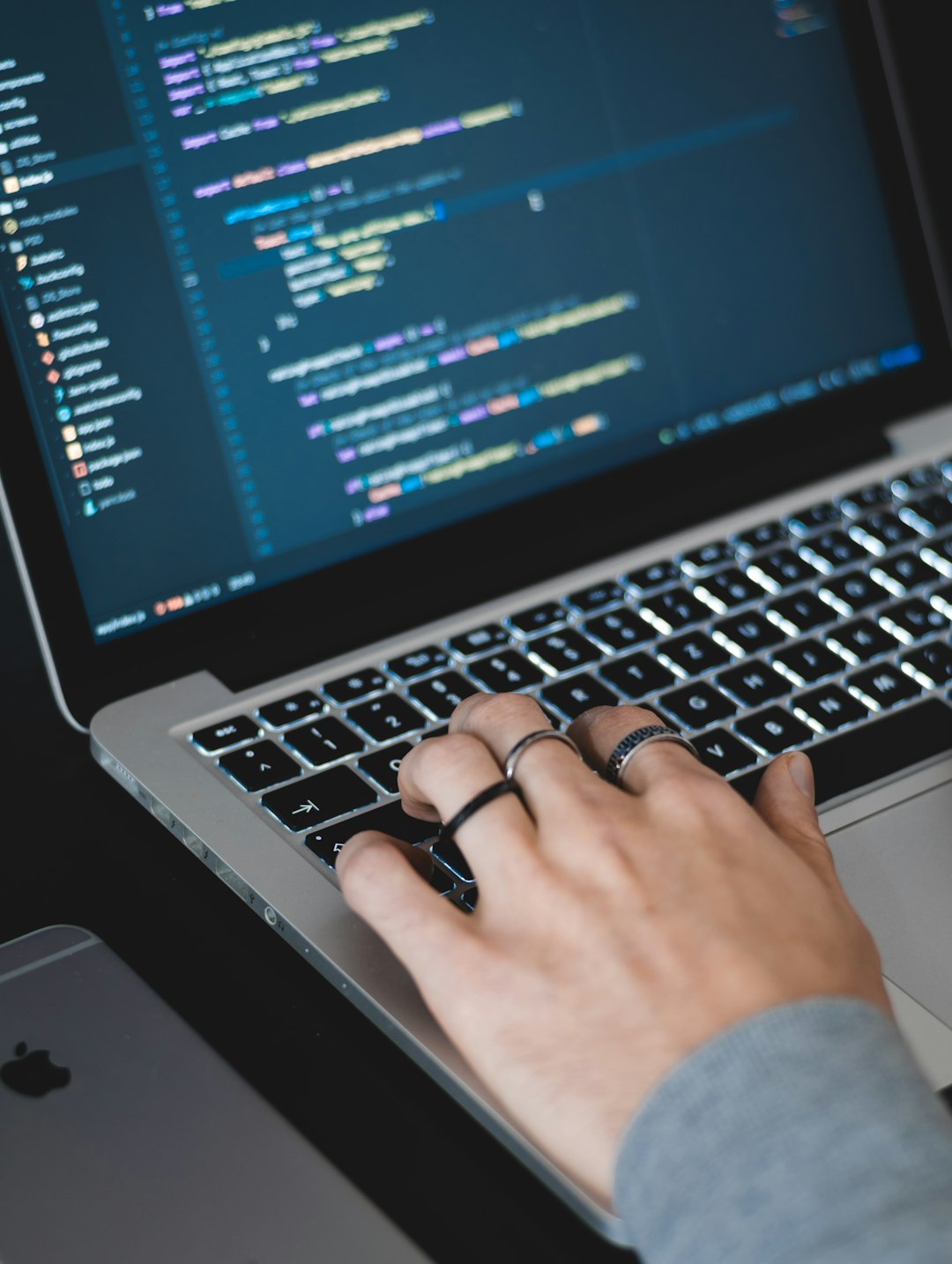 Coder Working on Macbook Pro